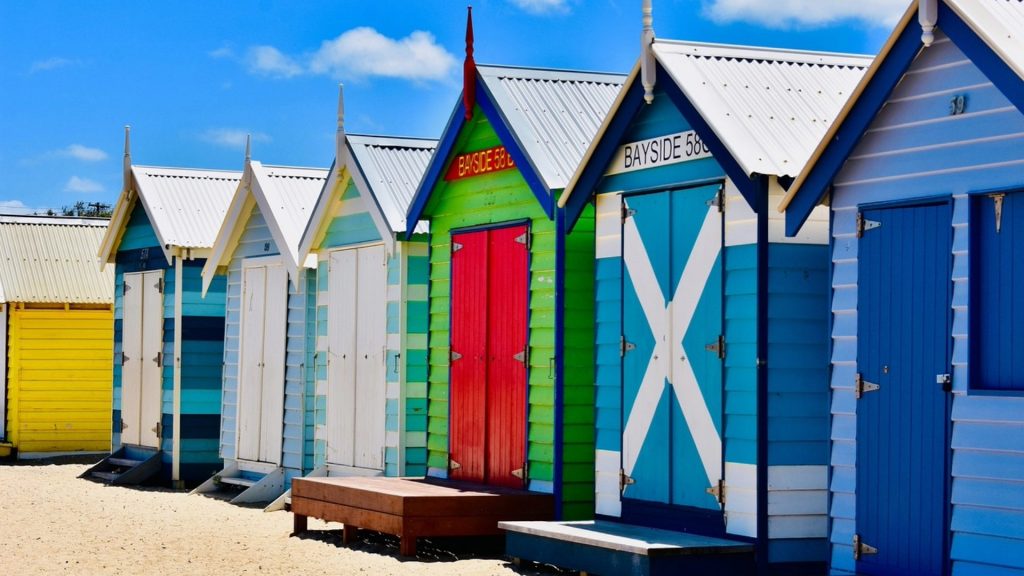 A splash of color by the sea — the beach huts of Brighton & Hove bring charm to the shoreline!