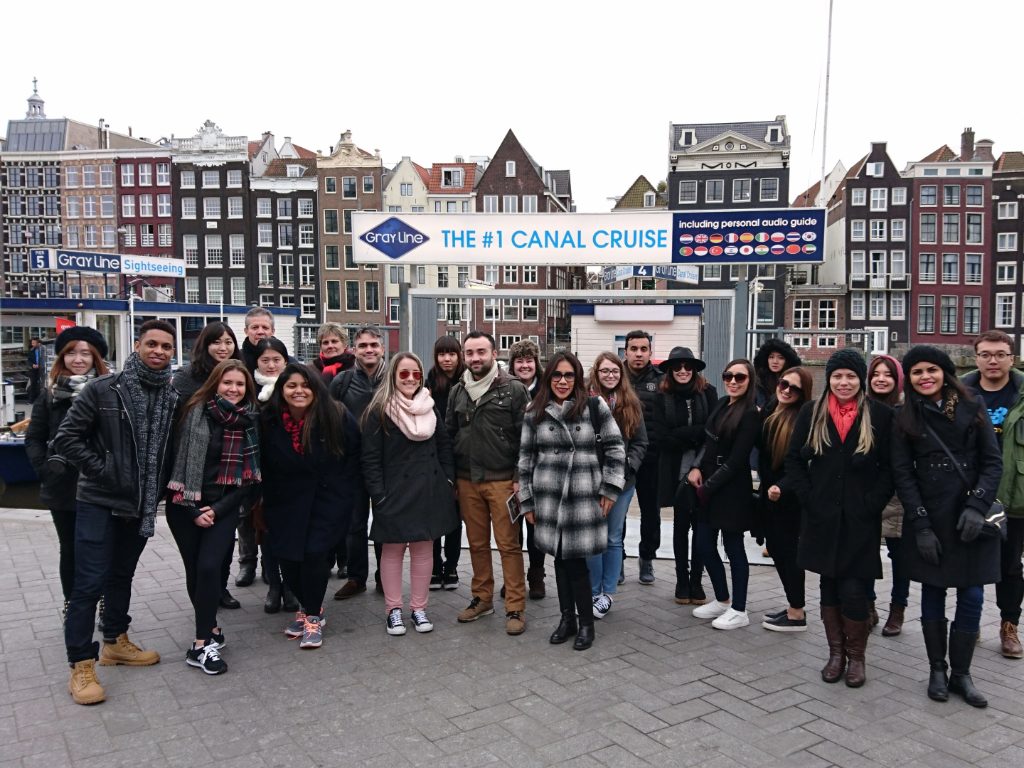 Student group tour to Amsterdam and about to board for a canal cruise