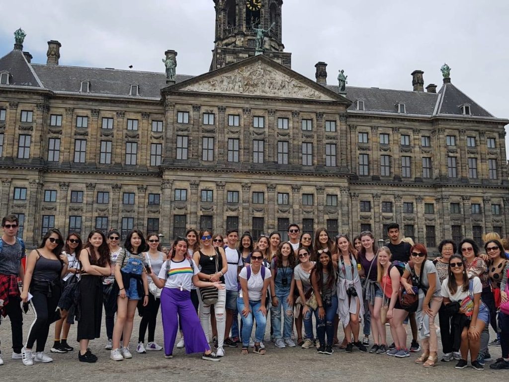 Dam Square is the vibrant heart of Amsterdam — where royal palaces, street performers, and city energy come together.