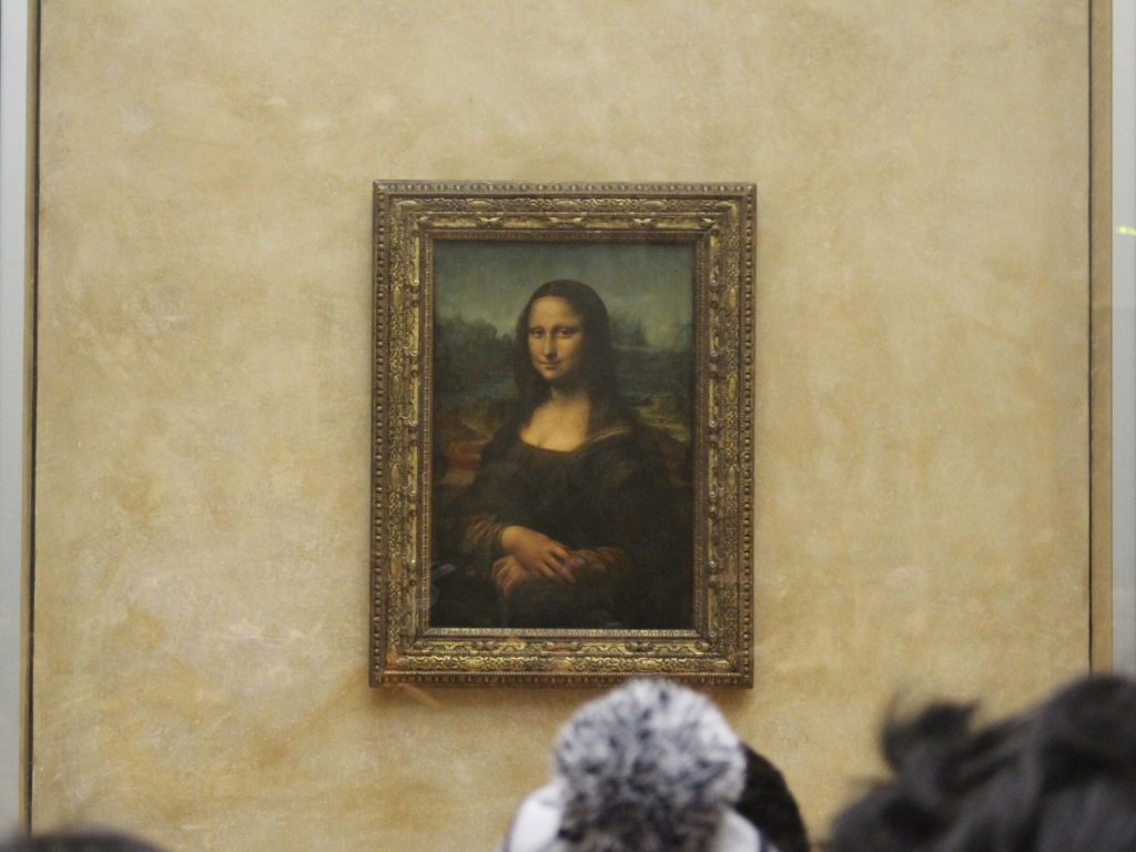 Louvre Museum - Da Vinci’s masterpiece and the OG enigmatic smile.