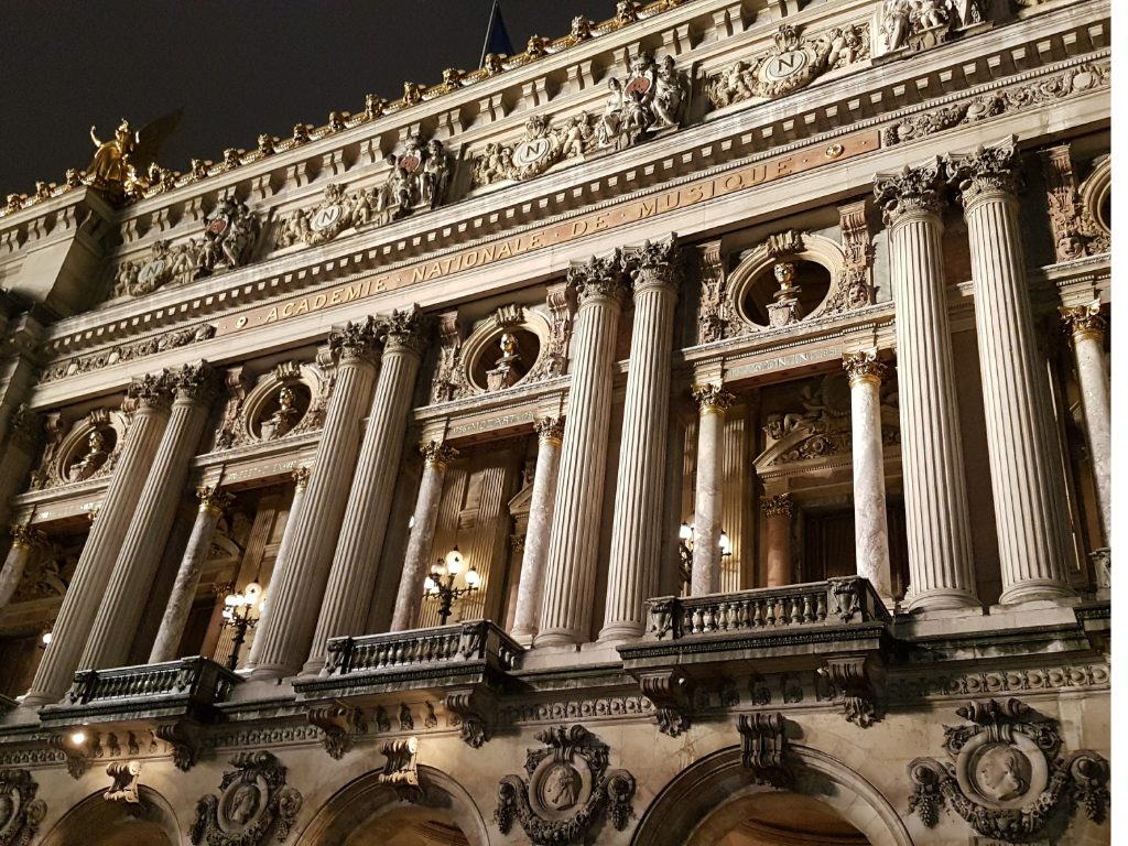 Golden lights and grand dreams—Paris’s opera house under the stars.