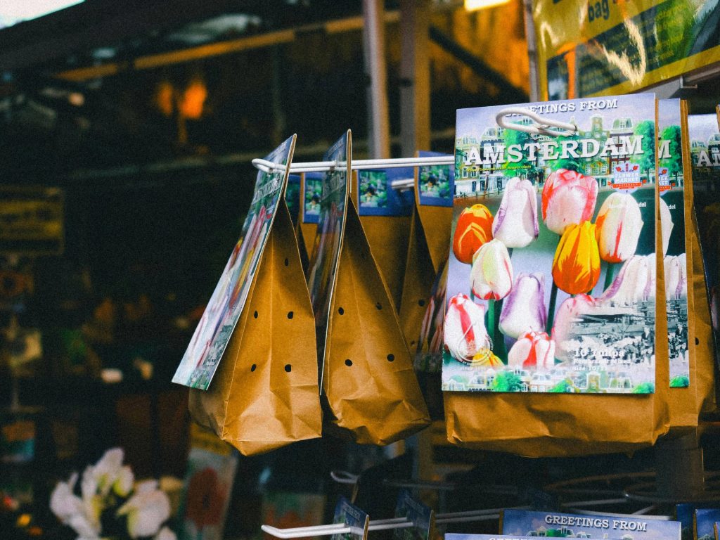 Stroll through a burst of color at Amsterdam’s famous Flower Market, where tulips and blooms line the canals in vibrant display.
