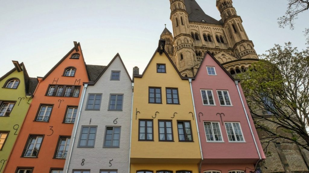 Colorful historic houses in Cologne's Altstadt—architecture students' dream streetscape.