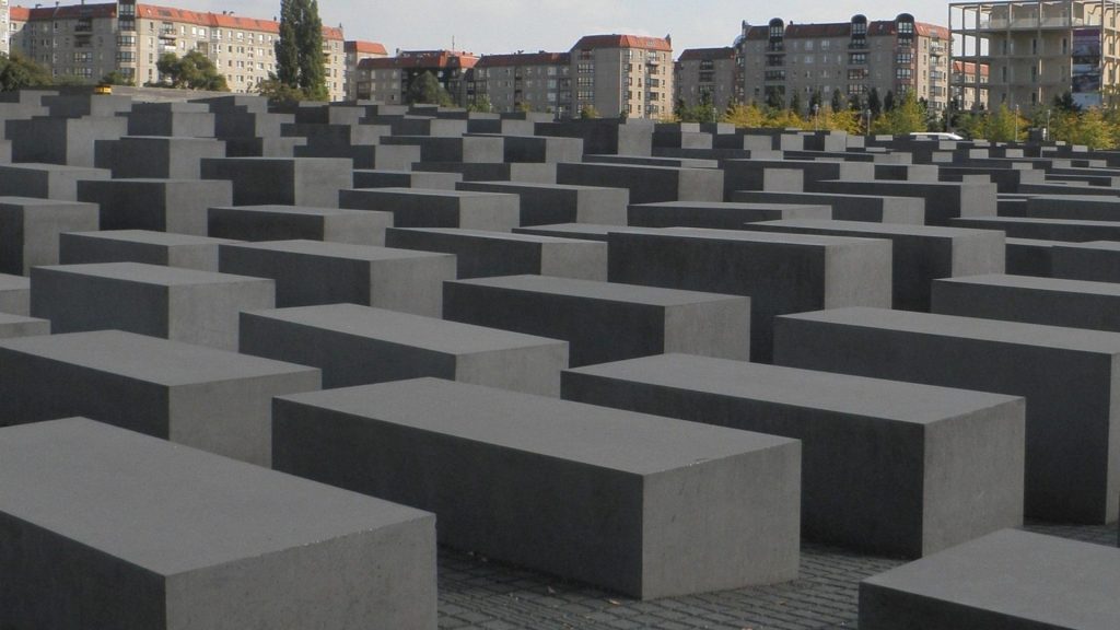 Holocaust Memorial's concrete blocks create a sobering landscape during Berlin historical study trip.