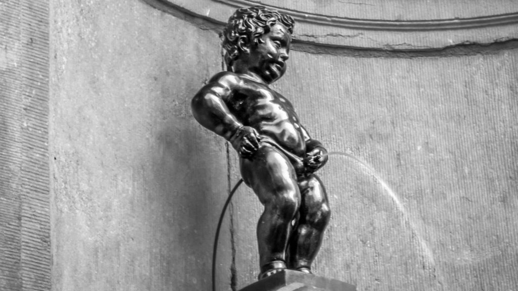Famous Manneken Pis statue in Brussels, a quirky landmark visited during European study trips